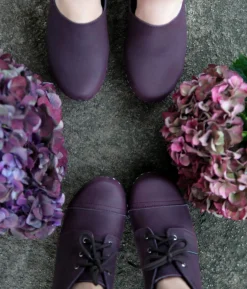 Chukka cap toe clog boots