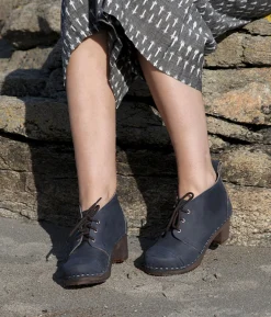 Chukka cap toe clog boots