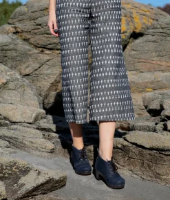 Chukka cap toe clog boots