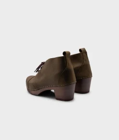 Chukka cap toe clog boots